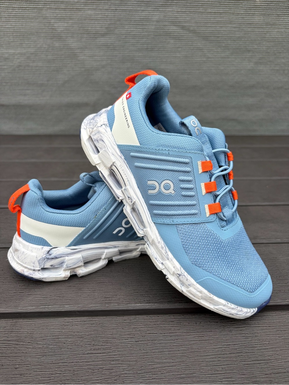 On Running CloudSwift Kids Light Blue with Orange Accents